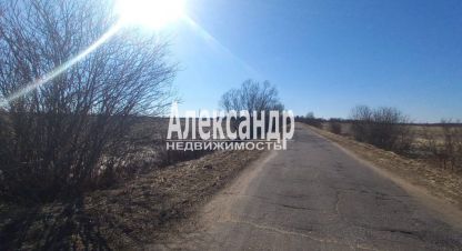 Купить земельный участок. Фотография №1 Продам земельный участок, на улице Новгородская, г. Пуговкино, Новгородская обл., Россия, агентство Александр-Недвижимость. Фотография №1